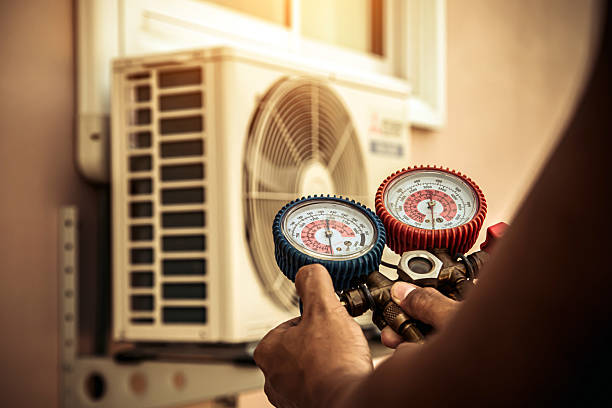 Professional Hvac Maintenance technician working in Camp H M Smith, HI